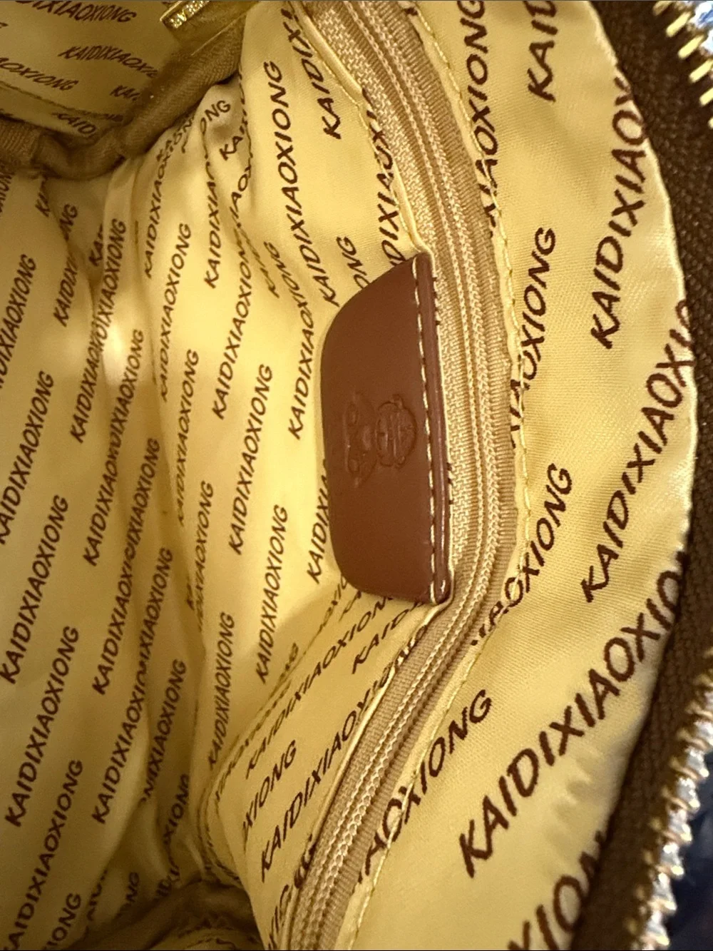 KAIDI Beige Canvas Mini Messenger Bag with Brown Trim and Bear Detail